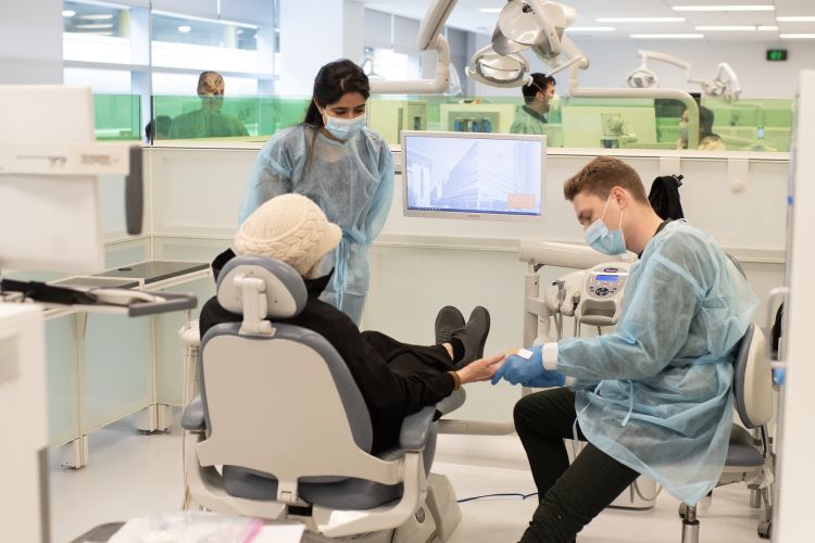 Dental students from the Arthur A. Dugoni School of Dentistry provide care to patients at the annual Senior Smiles and Wellness Health Fair in 2023.